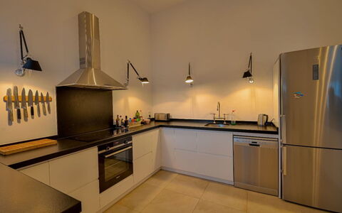 Romantica: Kitchen, Kitchen Appliance, Countertop, Major Appliance, Interior Design, Light Fixture, Flooring, Kitchen Stove, Cabinetry, Ceiling