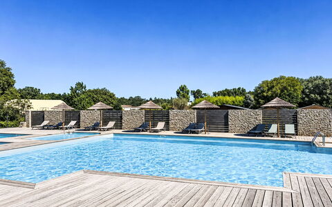 Hameau de Saint Cyprien: Swimming Pool, Resort, Outdoor Furniture, Furniture, Composite Material, Shade, Eco Hotel, Leisure, Sunlounger, Estate