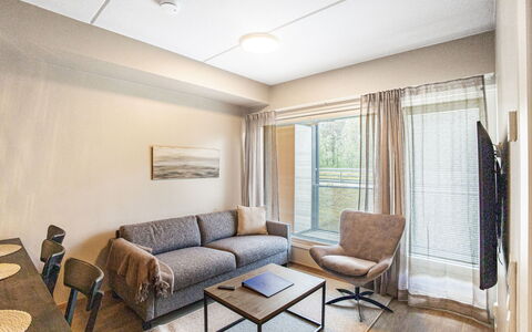 Äkäspokka: Furniture, Interior Design, Flooring, Floor, Wood, Ceiling, Room, Wood Flooring, Lighting, Couch