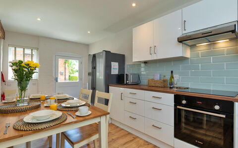 Farmhouse Cottage, Nether Burrows: Countertop, Kitchen, Flooring, Major Appliance, Interior Design, Kitchen Appliance, Wood, Cabinetry, Furniture, Ceiling