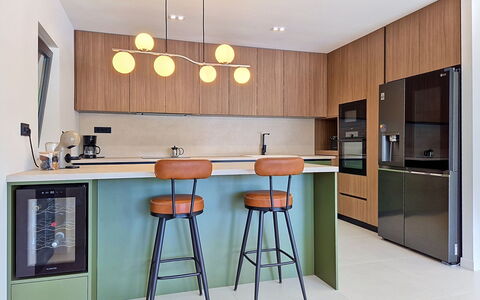 Sunce: Furniture, Interior Design, Kitchen, Countertop, Light Fixture, Cabinetry, Flooring, Wood, Ceiling, Kitchen Appliance