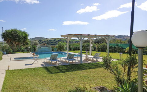 Villa Emme: Swimming Pool, Resort, Outdoor Furniture, Leisure, Shade, Garden, Eco Hotel, Chair, Landscaping, Backyard