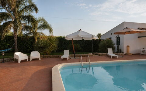 Villa Cigno Reale: Swimming Pool, Resort, Sunlounger, Eco Hotel, Hacienda, Shade, Hotel, Outdoor Furniture, Umbrella