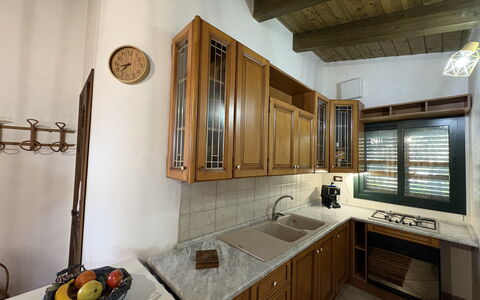 Il Cigno Reale Green: Kitchen, Interior Design, Wood, Countertop, Flooring, Ceiling, Cabinetry, Light Fixture, Floor, Furniture
