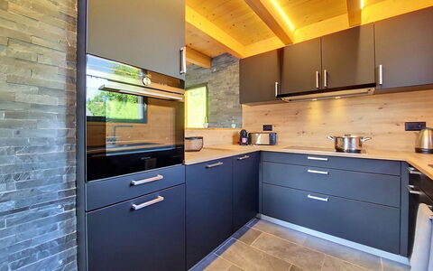 Chalet le Bleusy: Kitchen, Countertop, Wood, Flooring, Cabinetry, Interior Design, Kitchen Appliance, Furniture, Floor, Major Appliance