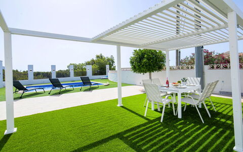 El Lloveret: Wood, Furniture, Chair, Sea, Apartment, Balcony, Ocean, Shade, Outdoor Furniture, Wood Stain
