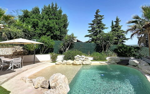 Villa le Lagon: Wood, Furniture, Chair, Sea, Apartment, Balcony, Ocean, Shade, Outdoor Furniture, Wood Stain