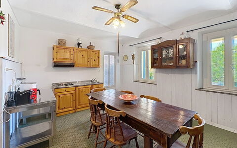 La Casetta di Palmira: Furniture, Flooring, Interior Design, Wood, Ceiling, Floor, Light Fixture, Chair, Lighting, Kitchen