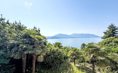 Malpaga: Sky, Blue, Green, Leaf, Nature, Vegetation, Natural Landscape, Landscape, Coastal And Oceanic Landforms, Plant Community
