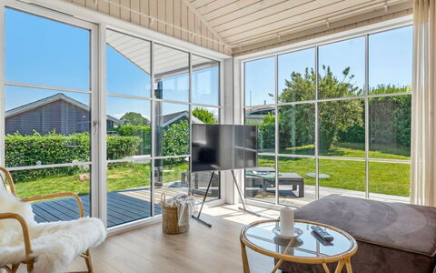 Väinö - 300M from the Sea: Interior Design, Porch, Door, Home, Furniture, Floor, Chair, Ceiling, Wood Flooring, Glass