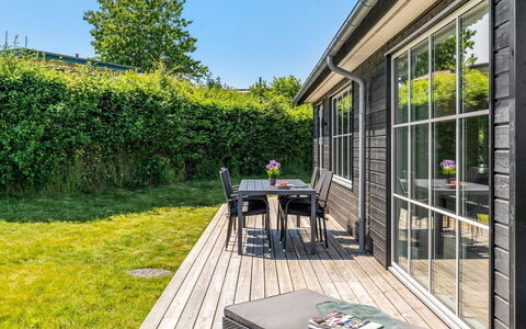 Väinö - 300M from the Sea: Home, Shrub, Garden, Door, Groundcover, Siding, Porch, Cottage, Yard, Shade
