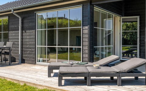 Väinö - 300M from the Sea: Door, Siding, Outdoor Furniture, Porch, Hardwood, Shade, Deck, Yard, Chair, Design