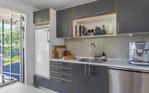 Leea - 100M from the Sea: Kitchen, Kitchen Appliance, Countertop, Major Appliance, Interior Design, Cabinetry, Flooring, Wood, Kitchen Sink, Furniture