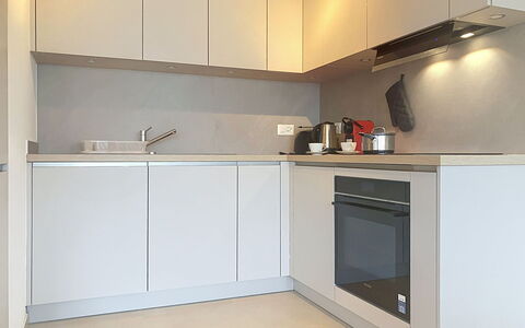 Résidence Croix de Coeur: Kitchen, Kitchen Appliance, Countertop, Cabinetry, Interior Design, Major Appliance, Flooring, Wood, Furniture, Floor