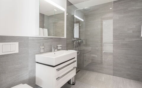 Taviarna Laax 4.5: Flooring, Floor, Interior Design, Bathroom, Plumbing Fixture, Tile, Sink, Bathroom Sink, Bathroom Cabinet, Plumbing