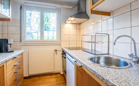 Casa Gronda 2: Kitchen, Countertop, Flooring, Wood, Sink, Major Appliance, Plumbing Fixture, Interior Design, Cabinetry, Kitchen Appliance