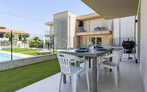 Residence Borgo Marinoni - Due: Swimming Pool, Residential Area, Thermae, Resort, Composite Material, Leisure, Estate, Artificial Turf, Hacienda, Villa