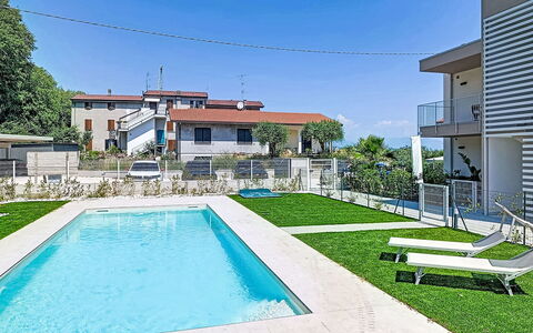 Residence Borgo Marinoni - Due: Swimming Pool, Residential Area, Thermae, Resort, Composite Material, Leisure, Estate, Artificial Turf, Hacienda, Villa