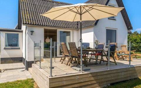 Alkmund - 100M from the Sea: Wood, Furniture, Deck, Outdoor Furniture, Hardwood, Chair, Plank, Wood Flooring, Shade, Porch