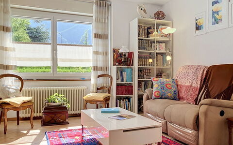 Cètici: Furniture, Interior Design, Flooring, Couch, Wall, Room, Shelving, Living Room, Floor, Wood