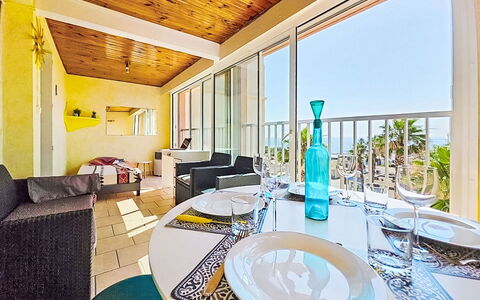 L'Acropole: Furniture, Outdoor Furniture, Chair, Shade, Outdoor Table, Houseplant, Patio, Yard, Design, Balcony