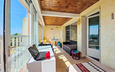 L'Acropole: Furniture, Outdoor Furniture, Chair, Shade, Outdoor Table, Houseplant, Patio, Yard, Design, Balcony