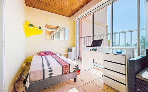 L'Acropole: Furniture, Outdoor Furniture, Chair, Shade, Outdoor Table, Houseplant, Patio, Yard, Design, Balcony