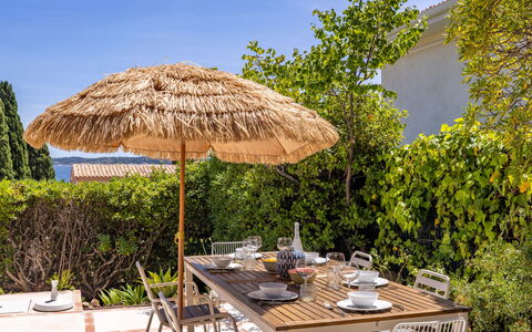 Floralies: Furniture, Outdoor Furniture, Chair, Shade, Outdoor Table, Houseplant, Patio, Yard, Design, Balcony