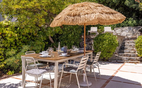 Floralies: Furniture, Outdoor Furniture, Chair, Shade, Outdoor Table, Houseplant, Patio, Yard, Design, Balcony