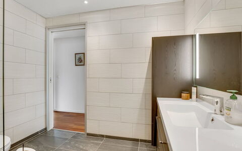 Floria - 500M from the Sea: Flooring, Wall, Floor, Interior Design, Wood, Ceiling, Bathroom, Plumbing Fixture, Lighting, Bathroom Cabinet