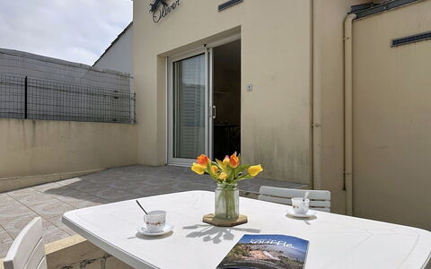 L'Ange Oliver: Floor, Door, Chair, Shade, Outdoor Furniture, Houseplant, Coffee Table, Balcony, Home Door