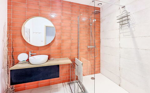 Sombreuil: Flooring, Plumbing Fixture, Bathroom, Floor, Orange, Tile, Interior Design, Plumbing, Composite Material, Mirror