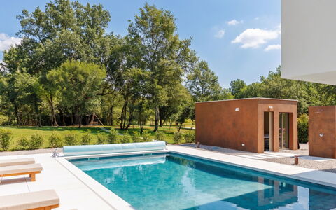 Ruma: Swimming Pool, Composite Material, Garden, Shade, Resort, Water Feature, Landscaping, Outdoor Furniture, Wood Stain, Backyard