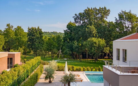 Ruma: Shrub, Garden, Swimming Pool, Shade, Lawn, Estate, Landscaping, Backyard, Yard, Resort
