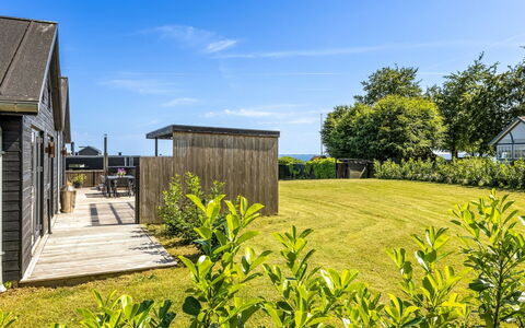 Andriette - 50M from the Sea: Groundcover, Cottage, Garden, Plank, Landscaping, Walkway, Yard, Fence, Boardwalk, Siding