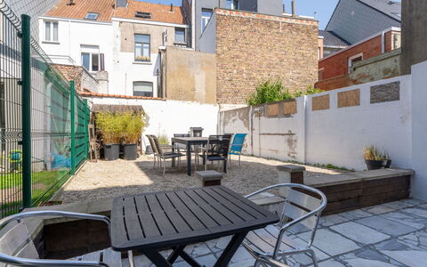 Villa Stil Genot with Terrace: Flowerpot, Outdoor Furniture, Chair, Houseplant, Outdoor Table, Courtyard, Balcony, Patio, Tile, Flagstone