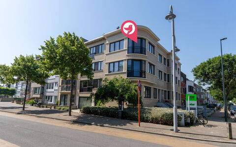 Centrally Located The Corner: Building, Window, Urban Area, Apartment, Residential Area, Neighbourhood, Asphalt, Urban Design, Condominium, Metropolitan Area