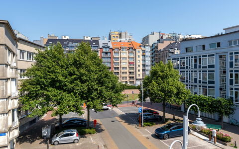 Centrally Located The Corner: Building, Daytime, City, Urban Area, Window, Apartment, Residential Area, Town, Metropolitan Area, Facade