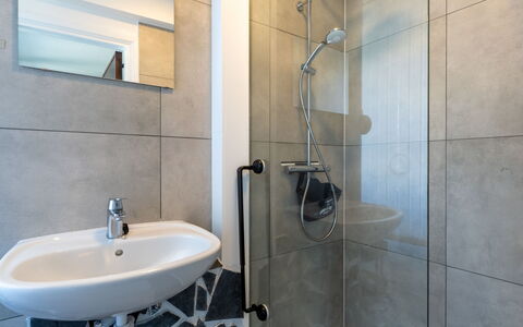 Centrally Located The Corner: Flooring, Plumbing Fixture, Floor, Bathroom, Interior Design, Shower, Shower Head, Plumbing, Tap, Room