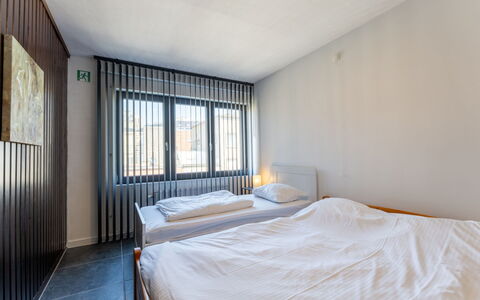 Centrally Located The Corner: Bedroom, Ceiling, Interior Design, Floor, Bed, Flooring, Bed Frame, Room, Bedding, Bed Sheet