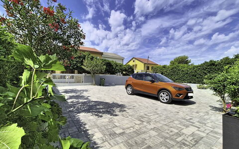 Pag Povljana 200: Driveway, Sidewalk, Garden, Landscaping, Shade, Walkway, Flagstone, Parking, Path