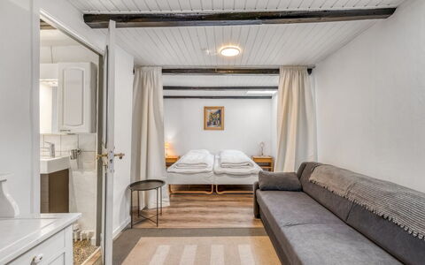 Sinikka - 600M to the Fjord: Furniture, Interior Design, Flooring, Floor, Wood, Ceiling, Bed, Room, Bedroom, Lighting