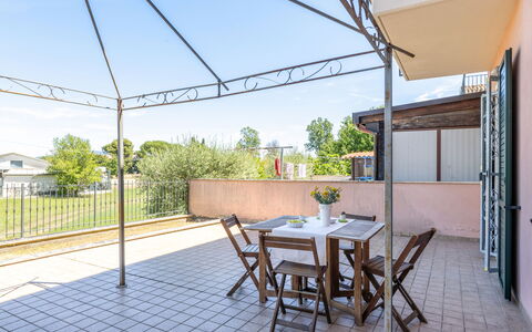 Sweet Loreto: Floor, Chair, Shade, Kitchen & Dining Room Table, Outdoor Structure, Houseplant, Outdoor Furniture, Balcony, Flowerpot, Daylighting