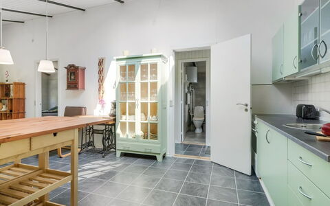 Milo - 200M to the Fjord: Furniture, Flooring, Interior Design, Floor, Wood, Kitchen, Cabinetry, Ceiling, Kitchen Appliance, Cupboard