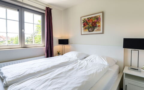 Duinenzicht with Balcony: Bed, Bedroom, Interior Design, Furniture, Bed Sheet, Bedding, Floor, Flooring, Ceiling, Room