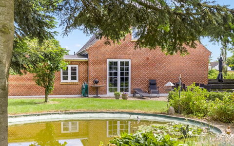 Melba - 13Km from the Sea: Grass, House, Shrub, Home, Roof, Residential Area, Cottage, Garden, Estate
