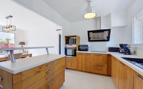Fourchaud: Countertop, Cabinetry, Furniture, Kitchen, Flooring, Interior Design, Wood, Kitchen Appliance, Ceiling, Floor
