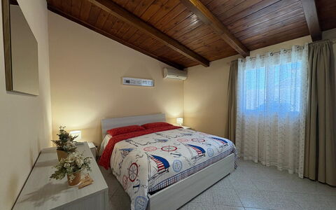 Villa Gloria: Bed, Interior Design, Furniture, Bedroom, Floor, Flooring, Room, Wood, Ceiling, Bed Sheet