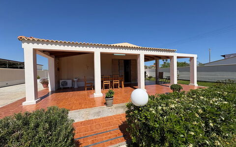 Villa Gloria: Roof, Home, Door, Shade, Column, Outdoor Structure, Estate, Patio, Concrete, Porch