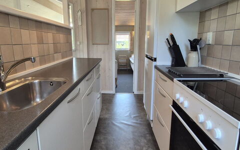 Vinny - 1Km from the Sea: Countertop, Kitchen, Major Appliance, Flooring, Kitchen Appliance, Wood, Cabinetry, Floor, Interior Design, Plumbing Fixture